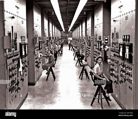 Women working in the control panel of the Y12 Calutron, which was used for Uranium enrichment ...