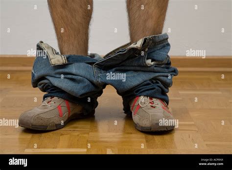 Pants around ankles Stock Photo - Alamy