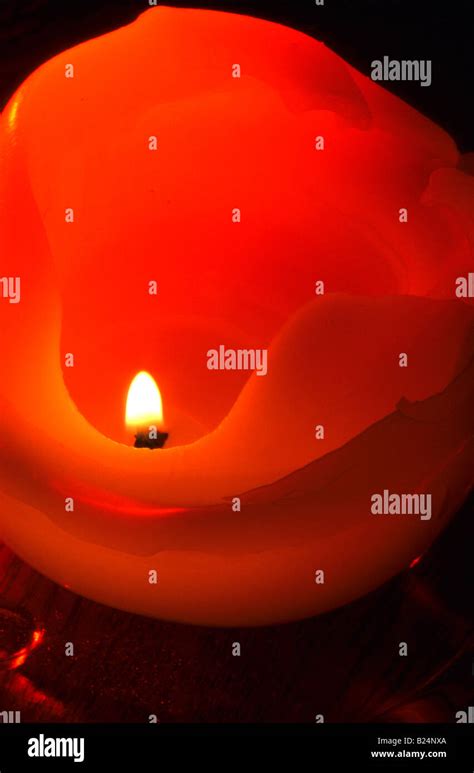 CLOSE UP BURNING CANDLE FLAME OF CANDLE Stock Photo - Alamy