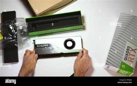 Paris, France - Feb 20, 2019: POV man unboxing latest Nvidia Quadro RTX ...