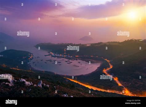 sunrise in sea and mountain Stock Photo - Alamy