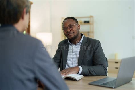 African American Attorney, Lawyers Discussing Contract or Business Agreement at Law Firm Office ...