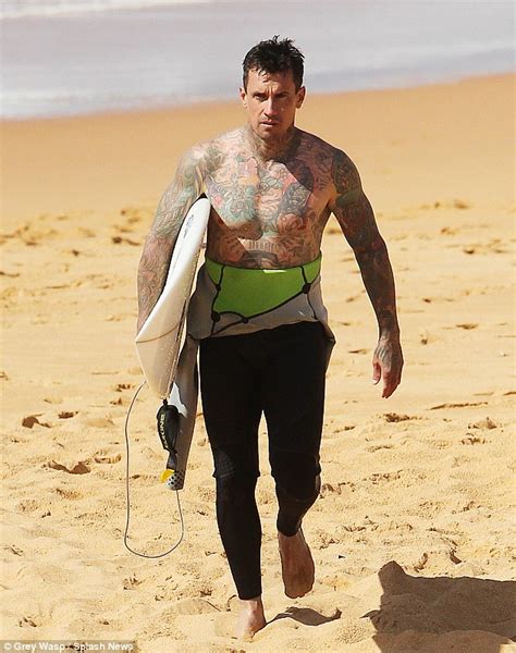 Carey Hart shows off his extensive body art as he joins wife Pink and ...