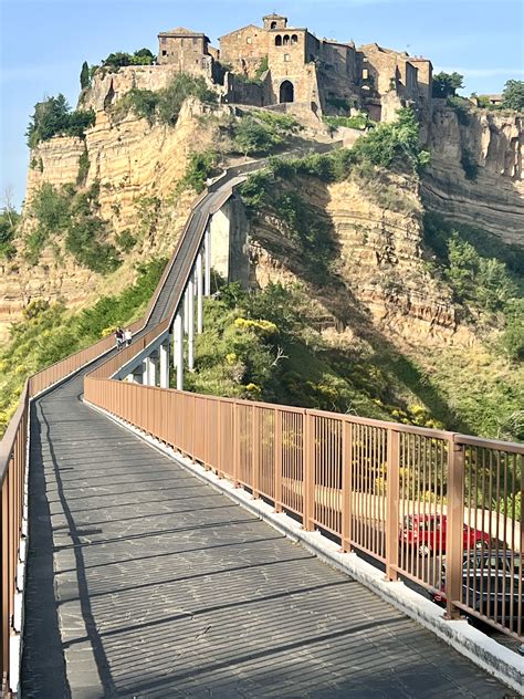 cityscape and pedestrian bridge of Civita di bagnoregio | City travel ...