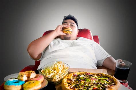 Pics Of Fat Man Eating Pizza Stock Photos, Pictures & Royalty-Free ...