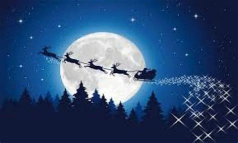 santa flying in the sky | See Santa & His Reindeer Fly Across The Sky ...