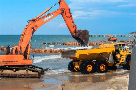 Construction of Breakwaters, Construction Equipment on the Sea Coast Editorial Image - Image of ...