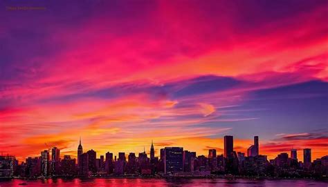 A sweeping pink sky across the Manhattan skyline. | Sunset, Manhattan ...