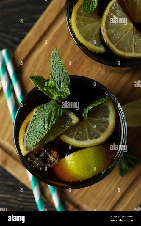 Board with glasses of Cuba Libre on wooden background Stock Photo - Alamy