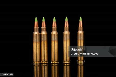 Green Tip Bullets Ordered Into The Line Stock Photo - Download Image Now - Ammunition, Army ...