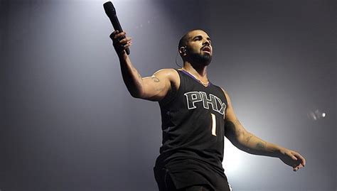 Drake Rocks Devin Booker Suns Jersey at Phoenix Show | NBA.com