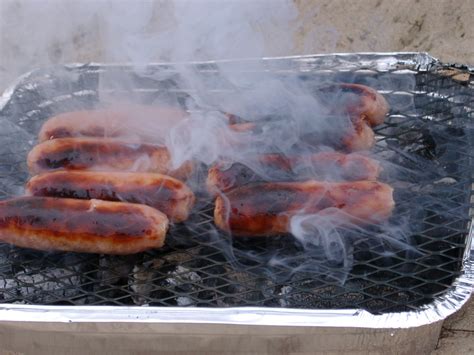 Free Stock photo of Sausages Cooking on Outdoor Charcoal Grill ...