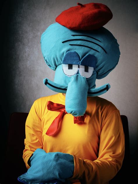 [SELF] More photos of my Artist Squidward cosplay. We got some very dramatic portrait shots. And ...