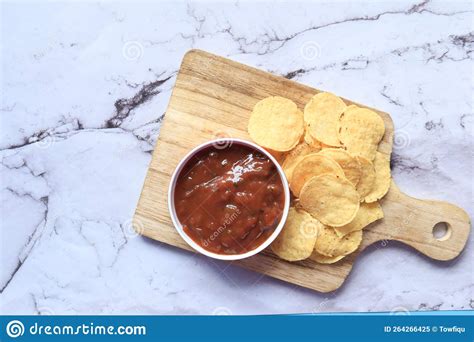 A Bowl of Chips and Salsa on Table , Stock Image - Image of preparation, vibrant: 264266425