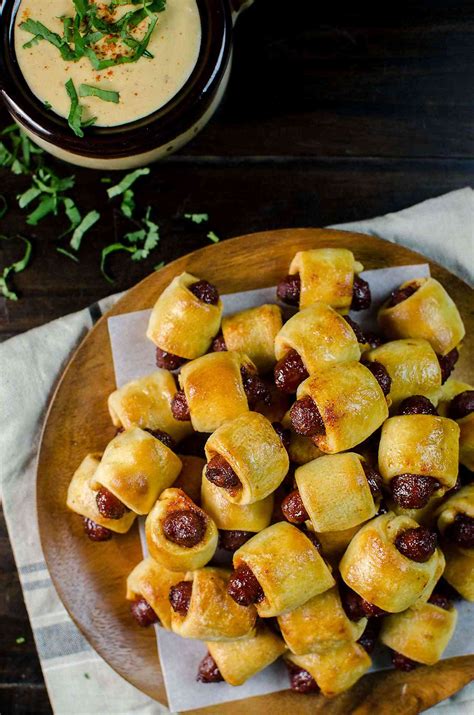 Sweet and Spicy Pigs in a Blanket with a Spicy Cheese dip - The Flavor Bender