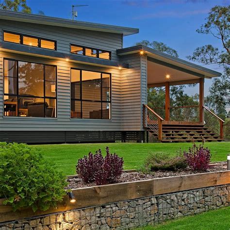 Linea weatherboards provide a classic Queensland look to this new home ...