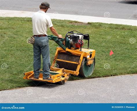 Riding Grass Roller Royalty Free Stock Images - Image: 2526929