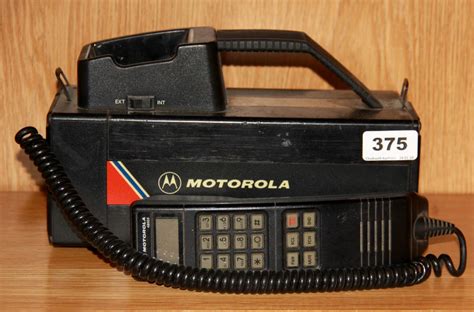 Sold Price: An early Motorola 4800X mobile phone, c. 1985, 26 x 19cm. - January 4, 0119 1:00 PM GMT