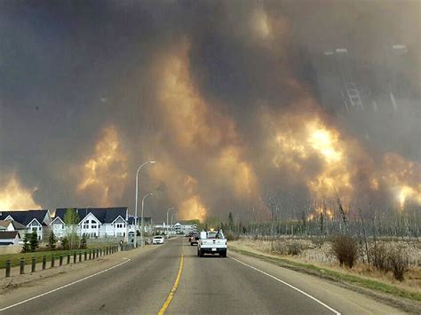 Fort McMurray wildfire in Alberta Canada forces evacuation of entire town - CBS News