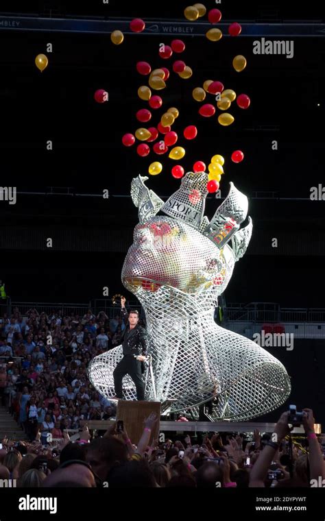 Robbie Williams performs his "Take the Crown" tour at Wembley Stadium ...