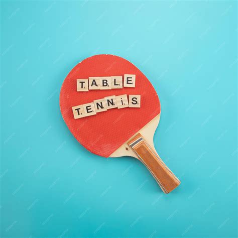 Premium Photo | Toy bricks on the blue table with word table tennis