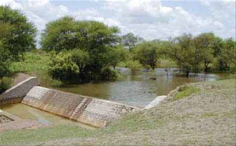 A masonry check dam at Kothapally watershed, Ranga Reddy, Andhra ...