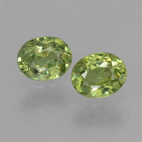 0.82ct Oval Cut Demantoid Garnet Gemstones | 4.9 x 4 mm | GemSelect