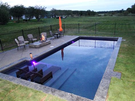 Simple Rectangular Pool With Pool Furniture And Fireplace | Rectangular pool, Inground pool ...