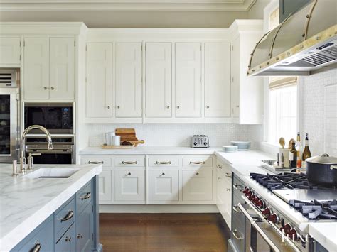 Contemporary White Kitchen with White Cabinetry - Luxe Interiors + Design