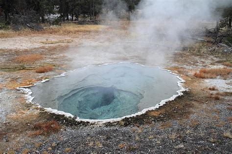 Hot Springs And Geysers In Yellowstone Photograph by Pierre Leclerc ...