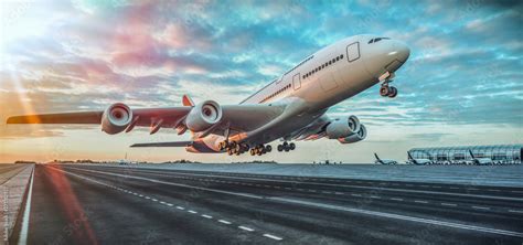 Airplane taking off from the airport. Stock Photo | Adobe Stock