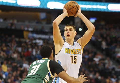 Nikola Jokic records his first triple-double as Nuggets beat Bucks | 9news.com