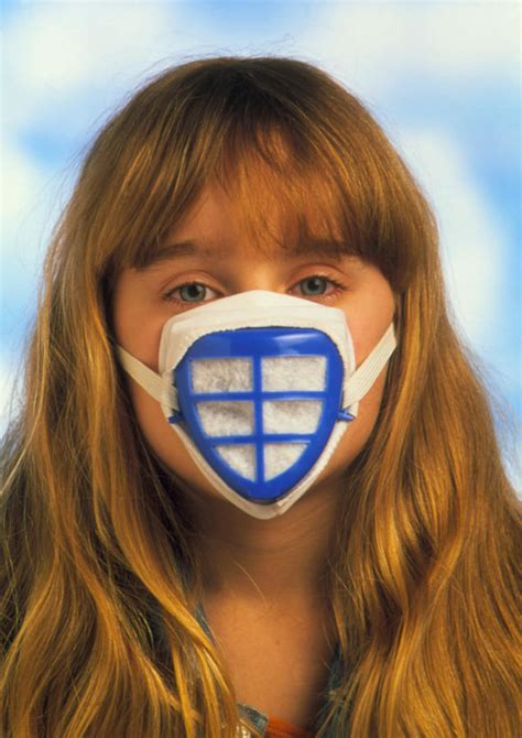 Child Wears Mask To Protect Against Air Pollution Photograph by Victor De Schwanberg - Pixels