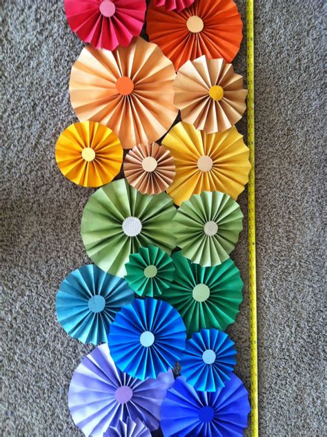 Paper folded flowers for March bulletin board | Diy bulletin board, Paper flowers, Bulletin ...