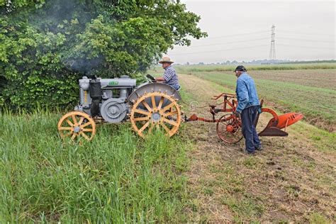 Plowing with old tractor editorial photo. Image of crop - 19725711