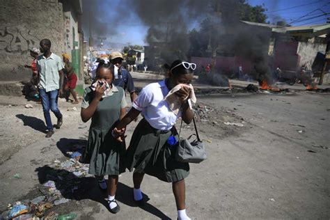 Protests in Haiti by police, tensions soar; roads blocked and airport ...