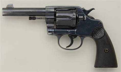 Colt New Service DA revolver, .45 Colt caliber, 4-1/2” barrel, re-blued finish, checkered black ha