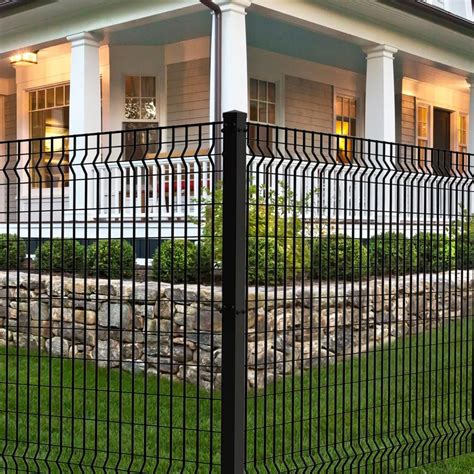 a black iron fence in front of a house