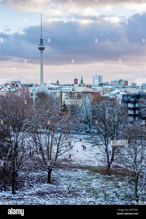 Berlin Skyline with TV tower & snow covered trees In Weinberg Park ...