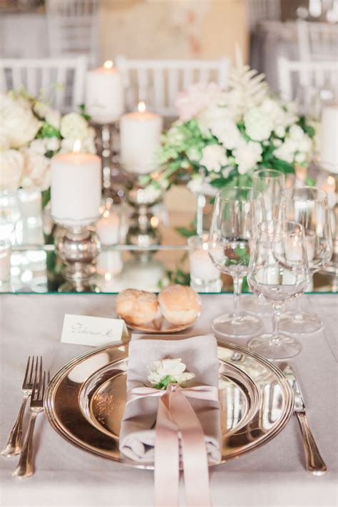 Blush pink table setting with white low florals centrepieces - Dream Irish Wedding