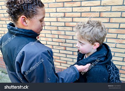 Big Bully Taking On Small Boy Stock Photo 132104972 : Shutterstock