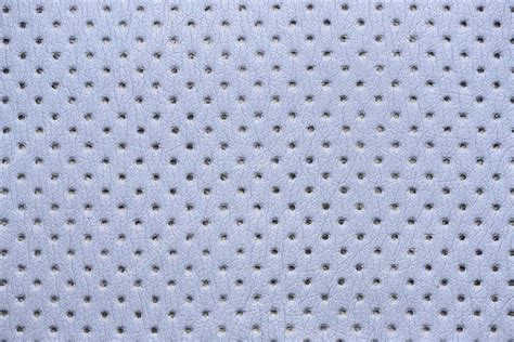 Blue perforated leather texture — Stock Photo © chones #128138712