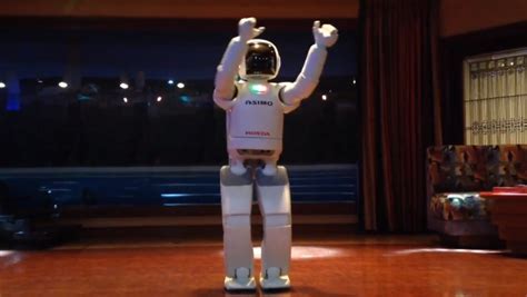 ASIMO the robot celebrates 'Friday dance party' | ITV News