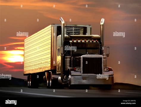 semi truck driving on highway at sunset Stock Photo - Alamy