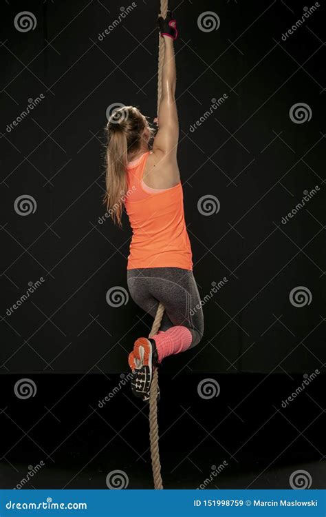 Athletic Girl Exercising with a Thick Rope Stock Image - Image of heats ...