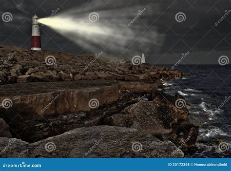 Lighthouse at Night with Beam of Light Stock Photo - Image of formation ...