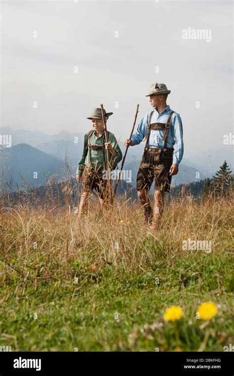 Germany, Bavaria, Two boys hiking in mountains Stock Photo - Alamy