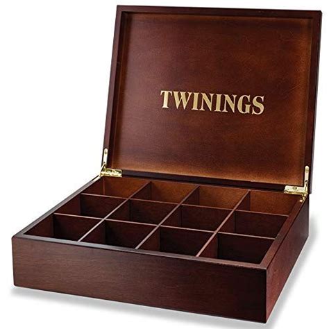 This is a lovely tea case which has 12 compartment slots and is walnut ...