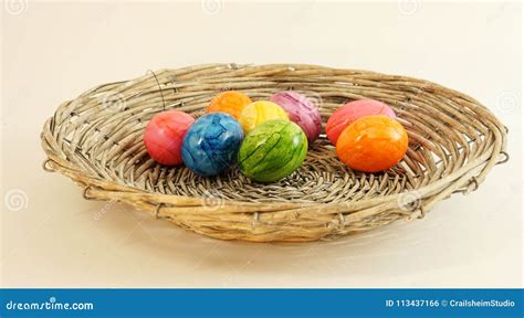 Colorful Easter Eggs in Basket Stock Photo - Image of easter ...