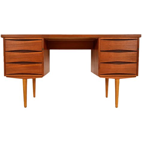 This is a 1960s modern Danish desk. Solid teak wood, with its original natural cherry finish ...